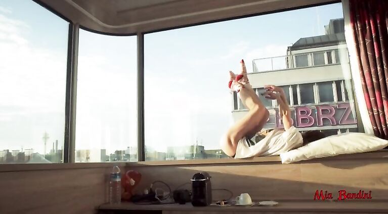 Amateur couple having passionate sex and cumshot on window